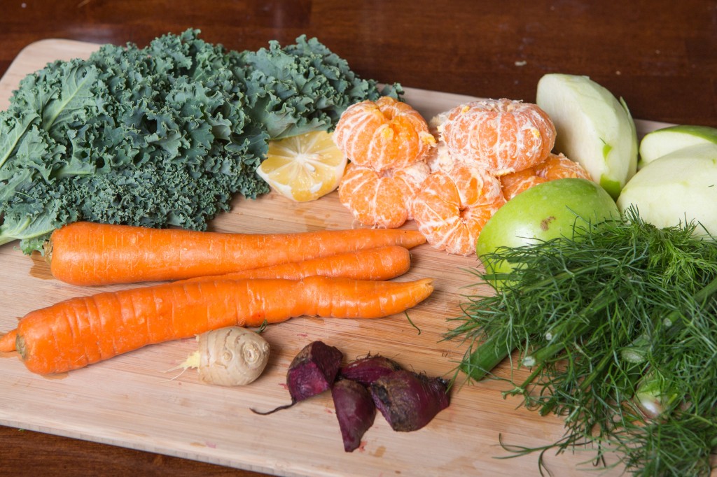 health flu shot juice juicing vegetables healthy ginger kale carrots beet orange apple fennel fit fitness recipe fitlife energy